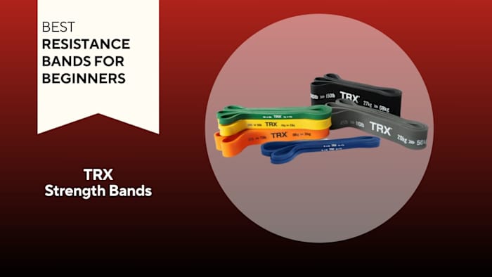 Photo of resistance bands against a red background